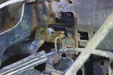 Install the smaller emergency brake cable bracket the farthest back on the driver side frame. fig. D.