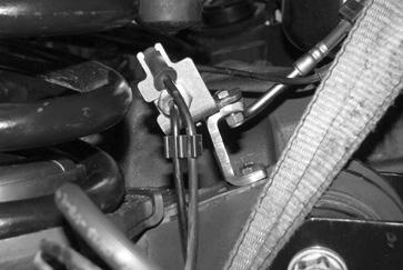 49. Locate and install the new coil spring (FT44316BK) using the