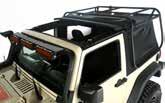 raising or removing the Jeep s soft top with ease without having to unload gear from the
