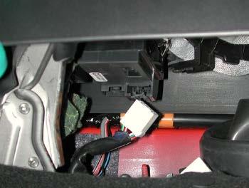 Disconnect the power window switch harness connector.