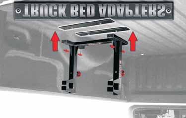 To operate the Lock-N-Load, rotate the knobs into the lock position and simply roll or ride your bike into the trailer until your foot pegs hit the open jaws of the Lock-N-Load.