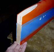 Apply epoxy to all surfaces to be glued. Slide fin into the fuse.