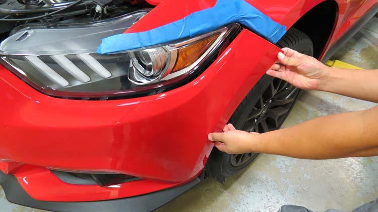 Tape up the fender as needed to prevent scratching the painted surfaces.
