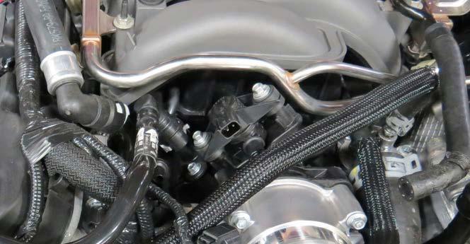 66. Remove the O-ring manifold gaskets from the factory manifold and install them onto