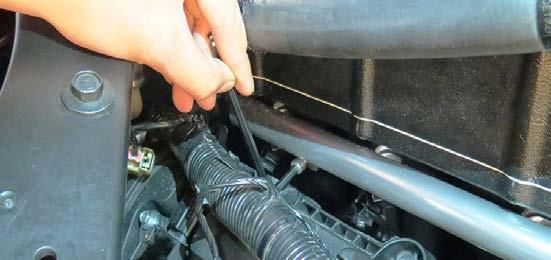 Be especially careful not to pinch any wires between the supercharger and the cylinder heads.