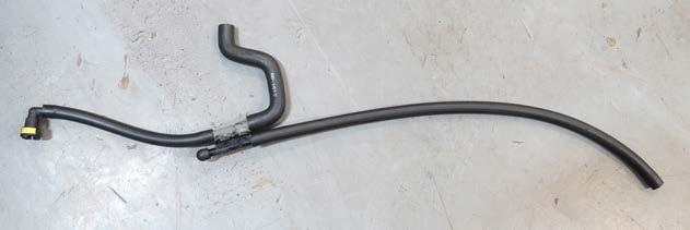 89. Remove the other two hoses from the brake aspirator and