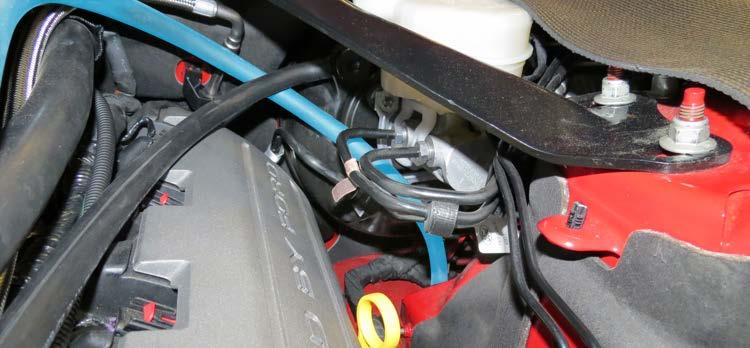 Open the fuse box and using a 10mm socket, attach the Power Supply Wire on the Water