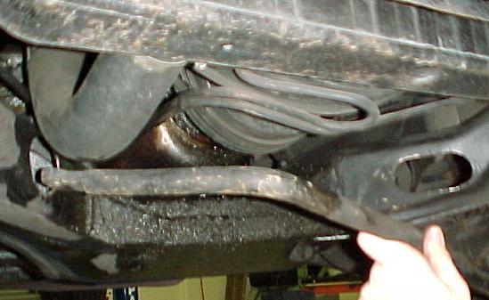 6) With the stock bar now removed, insert the Hotchkis bar by