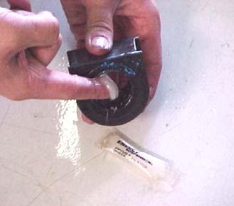 8) Use the grease pack provided to put a heavy coat of grease on the inside of the