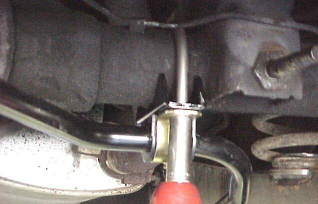 Slide the bushing brackets over the u-bolts to rest against the axle brackets.