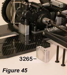 Secure the Transmission to the Chassis using (4) 1/2 FH Screws that pass thru the bottom of the Chassis and the Spacer,