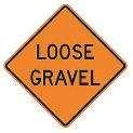 6. This sign means that: A. There are trucks hauling gravel ahead. B. The highway ahead is under construction. C. The highway ahead is covered with loose gravel. D.