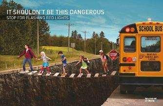 Driving safely around school buses IT SHOULDN T BE THIS DANGEROUS STOP FOR FLASHING RED LIGHTS Always stop at least 30 feet from the back and front