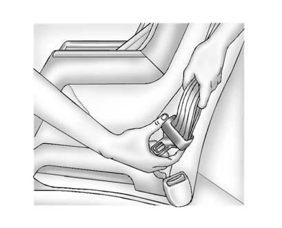 Pick up the latch plate, and run the lap and shoulder portions of the vehicle's safety belt through or around the