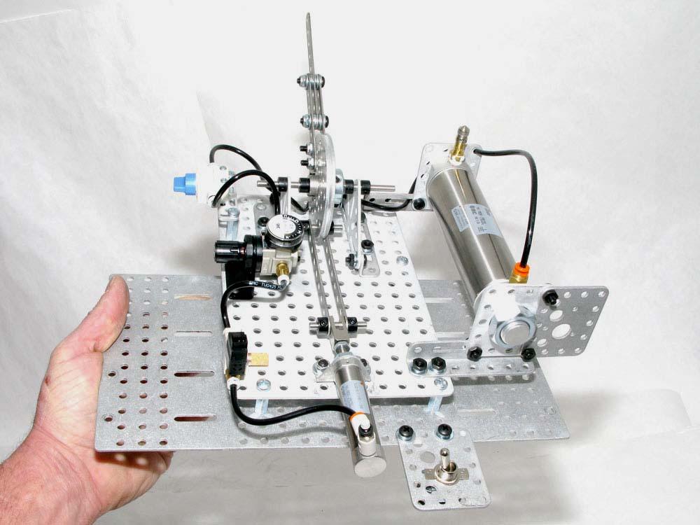 The image below shows the pneumatic module attached to the chassis top plate.