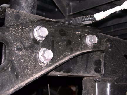 E. Trailer Hitch: Remove four bolts and rear bumper from O.E. trailer hitch brackets.