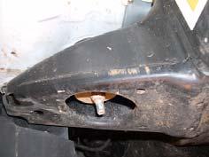 Loosen, but DO NOT REMOVE, cab mounting bolts on driver side. c. Without O.