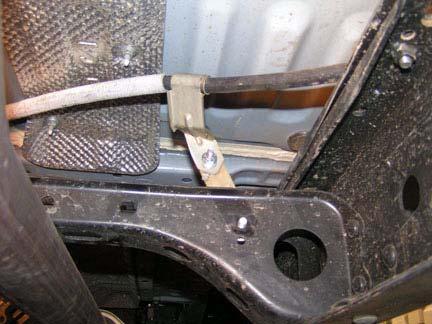 Install passenger side parking brake cable to kit bracket with kit nut (1/4 Nylock) and kit washer (1/4 SAE). 2.