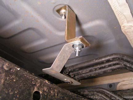 Install fuel line bracket to kit bracket (2 stand off) with kit bolt (1/4 x 1 ), two kit washers (1/4 SAE) and kit nut