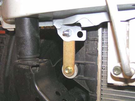 c. Install radiator and four kit brackets to core support with four