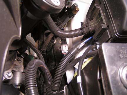 9. Remove heater hoses from clip on backside of engine. Heater Hoses 11.