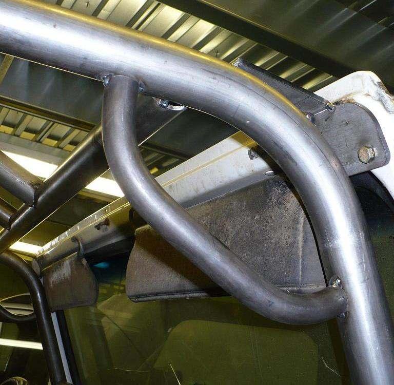 18) Position the grab handles as shown below and weld into place. 19) At this point, cage installation is complete. Paint cage desired color to prevent rusting.