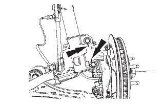 4. Support the hub assembly, unthread the spindle nuts and remove spindle bolts from the strut assembly (Fig. C.3). fig. C.3 5.