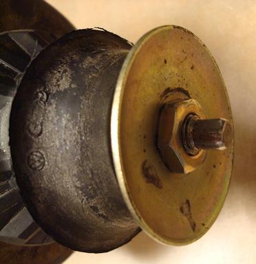 Support the hub assembly. Unbolt the lower shock mounting bolt and nut, save for later reinstallation (fig. 2). fig. 2 2.