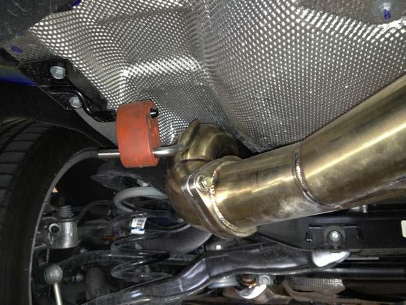 With the entire exhaust loosely installed, go back to the front of the exhaust and begin to tighten everything down.