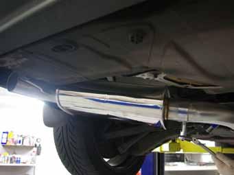 11 Adjust the rear muffler where the rear elbow is angled appropriately so the tip can exit the rear bumper.
