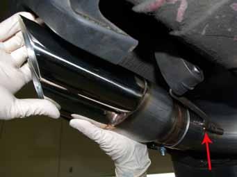 13 The tip has enough adjustability where it will slide all the way down against the rear muffler hanger.