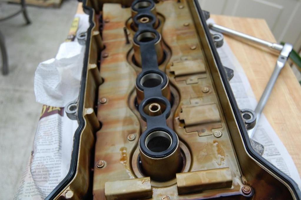 Now those famous words reinstallation is the reverse of removal. Gently align the valve cover on top of the engine. Install & hand tighten all the bolts in a random order till they are snug.
