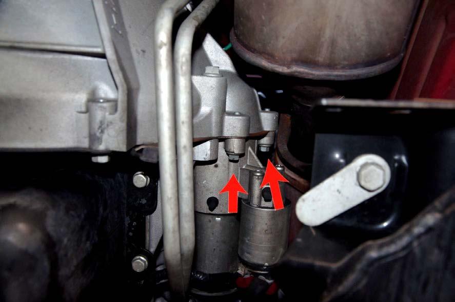 Photo shows 3 bolts removed with
