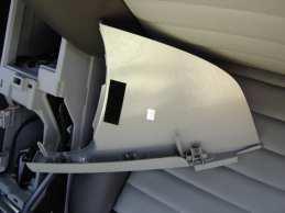 Remove the center console finish panels by pulling them towards the back of
