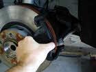 Inspect the brake hardware, wheel cylinders and hoses for damage. Inspect the brake drum for damage, or excessive wear. Replace or resurface the drum as necessary.