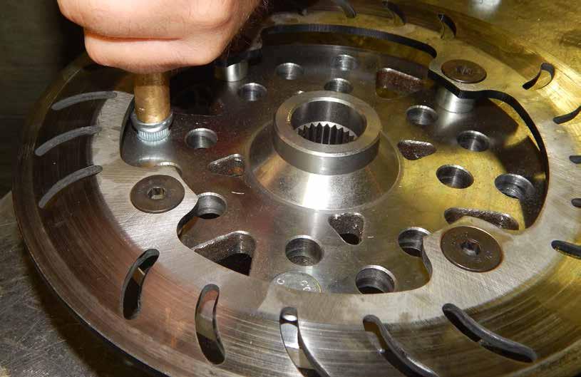 Install provided Studs into Rotors (A): - See