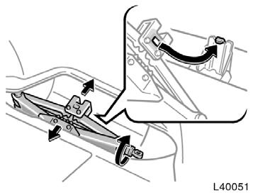 Blocking the wheel To store the jack, align the hole of the jack head with the vehicle hook. Turn the jack joint until the jack base fits securely with the vehicle body.
