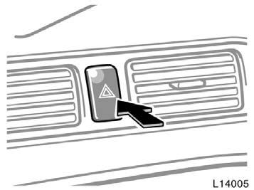 The lever automatically returns after you make a turn, but you may have to return it by hand after you change lanes.