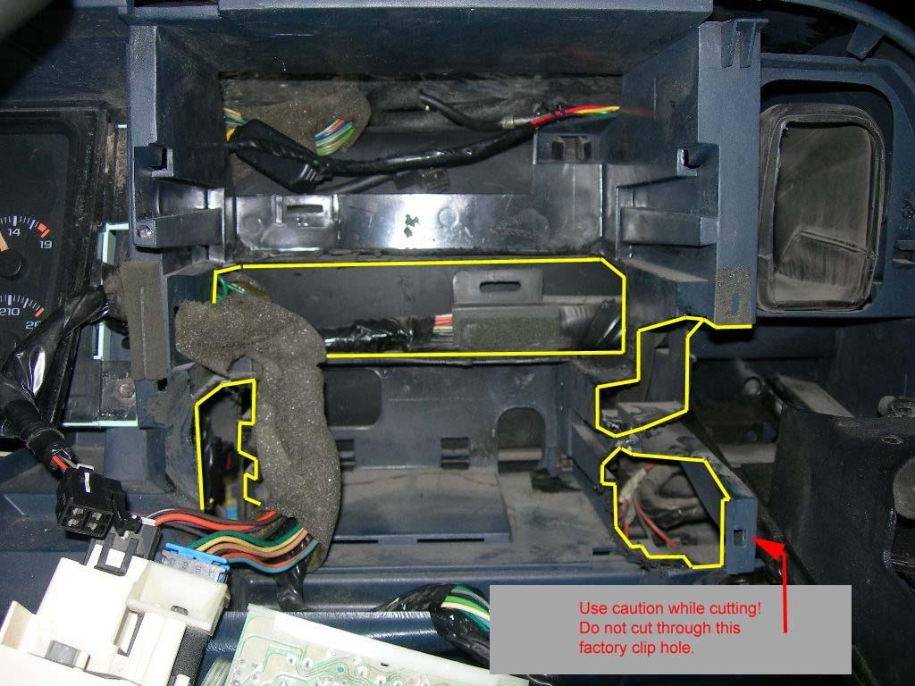 5. With the dash apart, use the mounting bracket and the pic below as a guide to show you what internal dash plastic must be trimmed.
