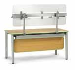 Or position it on the end of a rectangular desk to create a peninsula for small-group meetings. See pg. 99 for leg set options.
