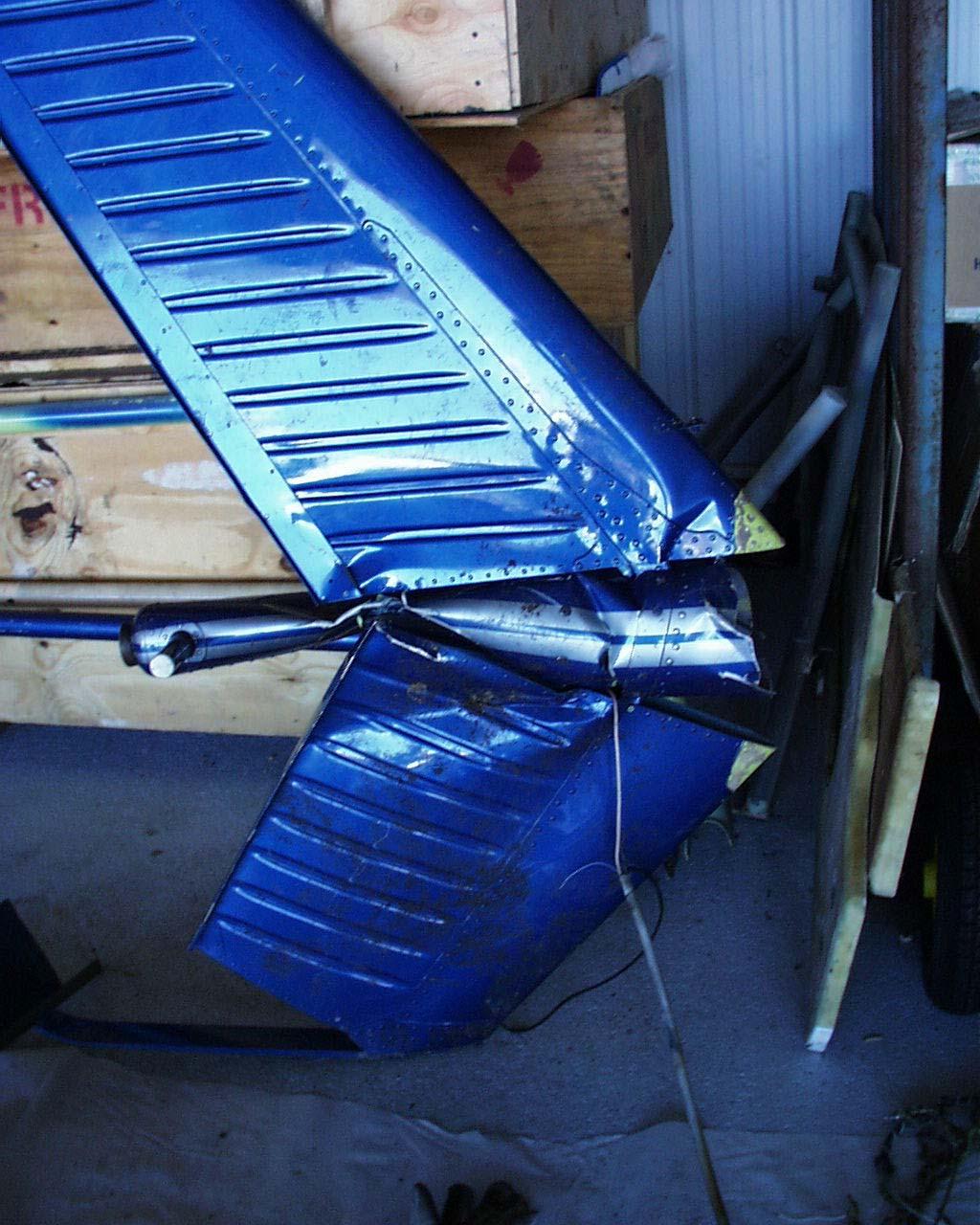 The vertical fin assembly and tail cone were detached from the tailboom.