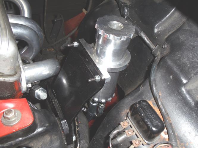 mount bolts and install the power steering reservoir &