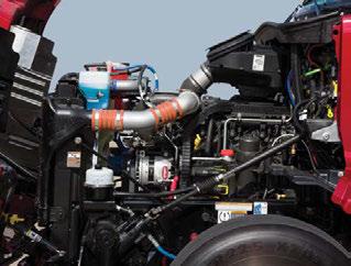 The engine compartment was designed to locate all fl uids on the driver s side the cooler side of the engine and