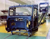 Kenworth melds aluminum, fiberglass and steel including 150 pounds of steel reinforcement into an assembly meant to withstand a lifetime of hard labor.