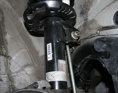 Control, detach the unit from the lower control arm (fig.