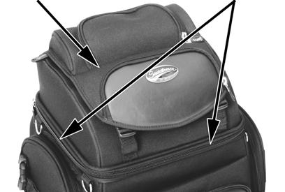 SECURING APPAREL UNDER THE UPPER STORAGE COMPARTMENT LID: You can use the upper storage compartment lid to hold a jacket or another piece of apparel