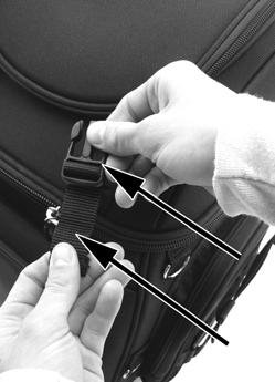 Adjust the length of the straps so when you close the lid and reconnect the buckles, the apparel is held securely under the upper compartment lid.