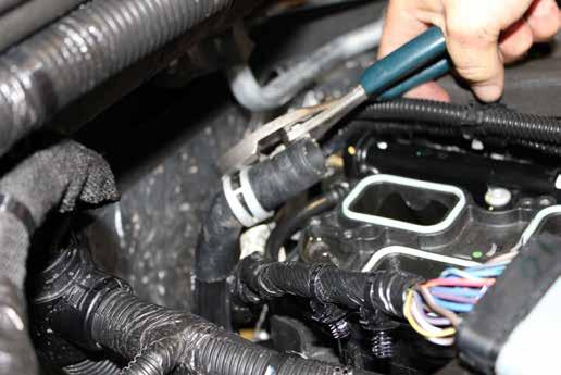 Install supplied heater hose to fitting near alternator and attach to dr