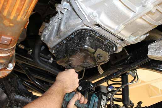 Remove the oil pan bolts. c. Remove oil pan from the engine.