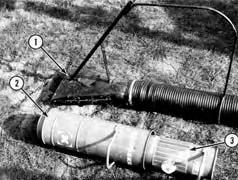 operator was periodically subjected to static electricity shocks from the fl exible vinyl hose. Static electricity shocks were also received from the standard fl exible rubber intake hose.